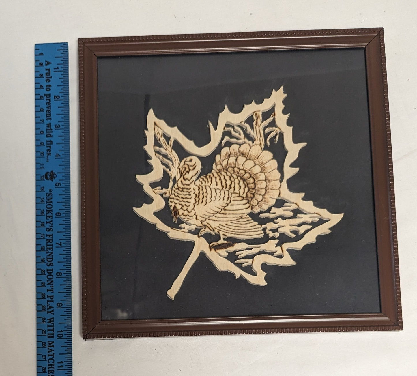 Art Hand Scroll Sawn Delicate "Wild Turkey " Mapleleaf Emblem" in frame under glass