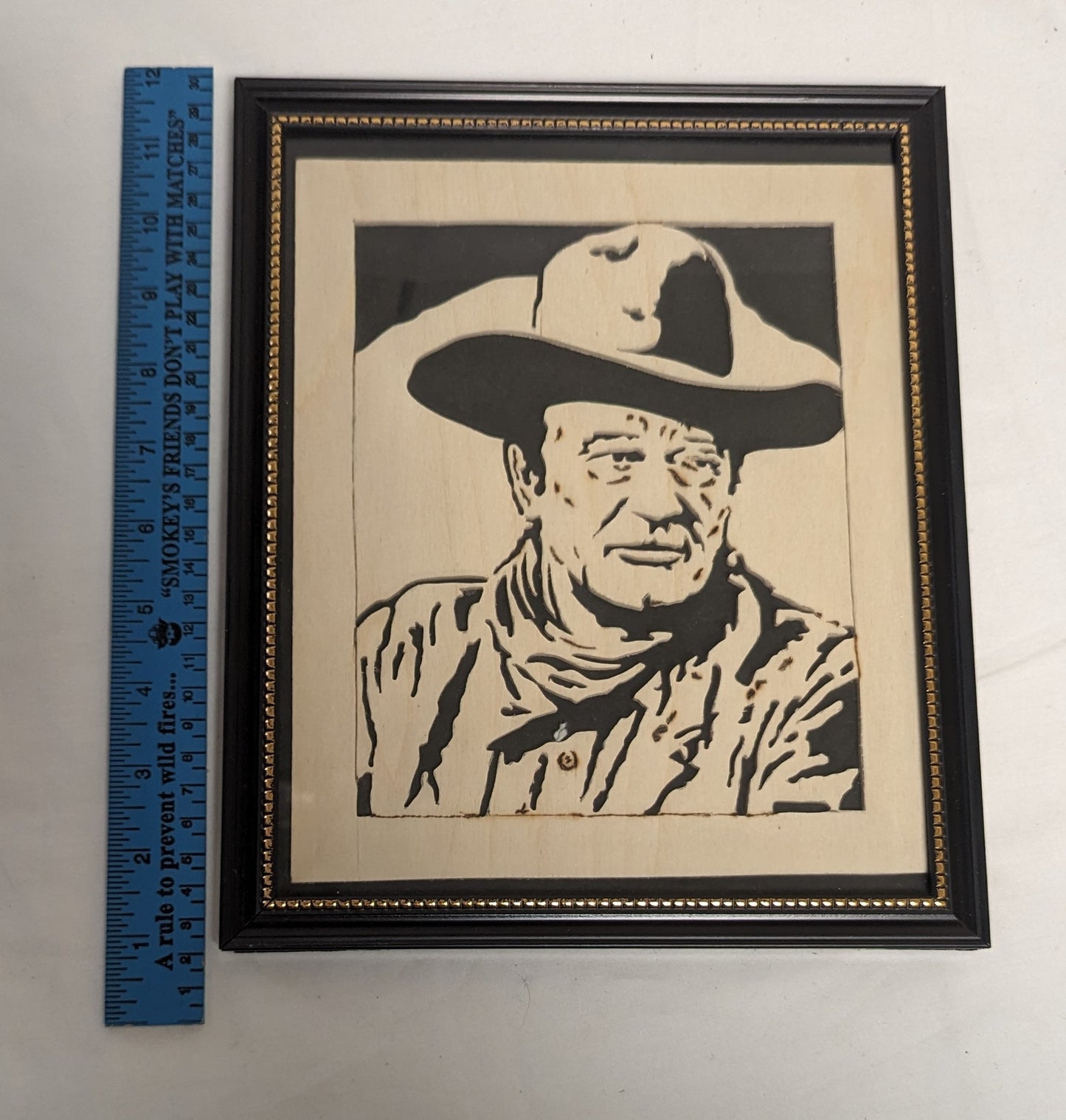 Art Hand Scroll Sawn Cut Out " John Wayne " Portait in frame under glass Credited and Autographed