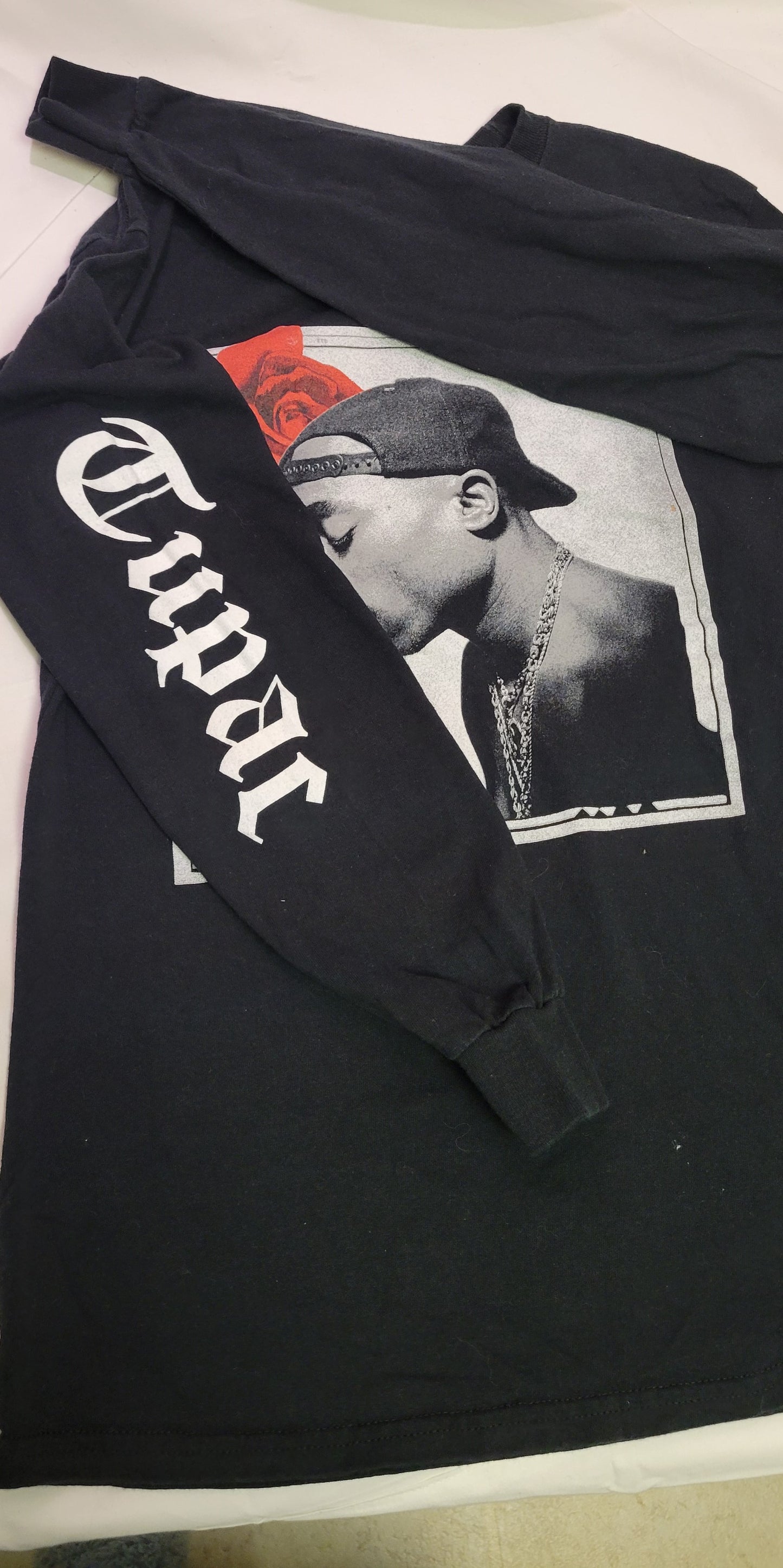 TShirt Long Sleeve Tupac with Rose Tupac printed on one arm. Size Medium