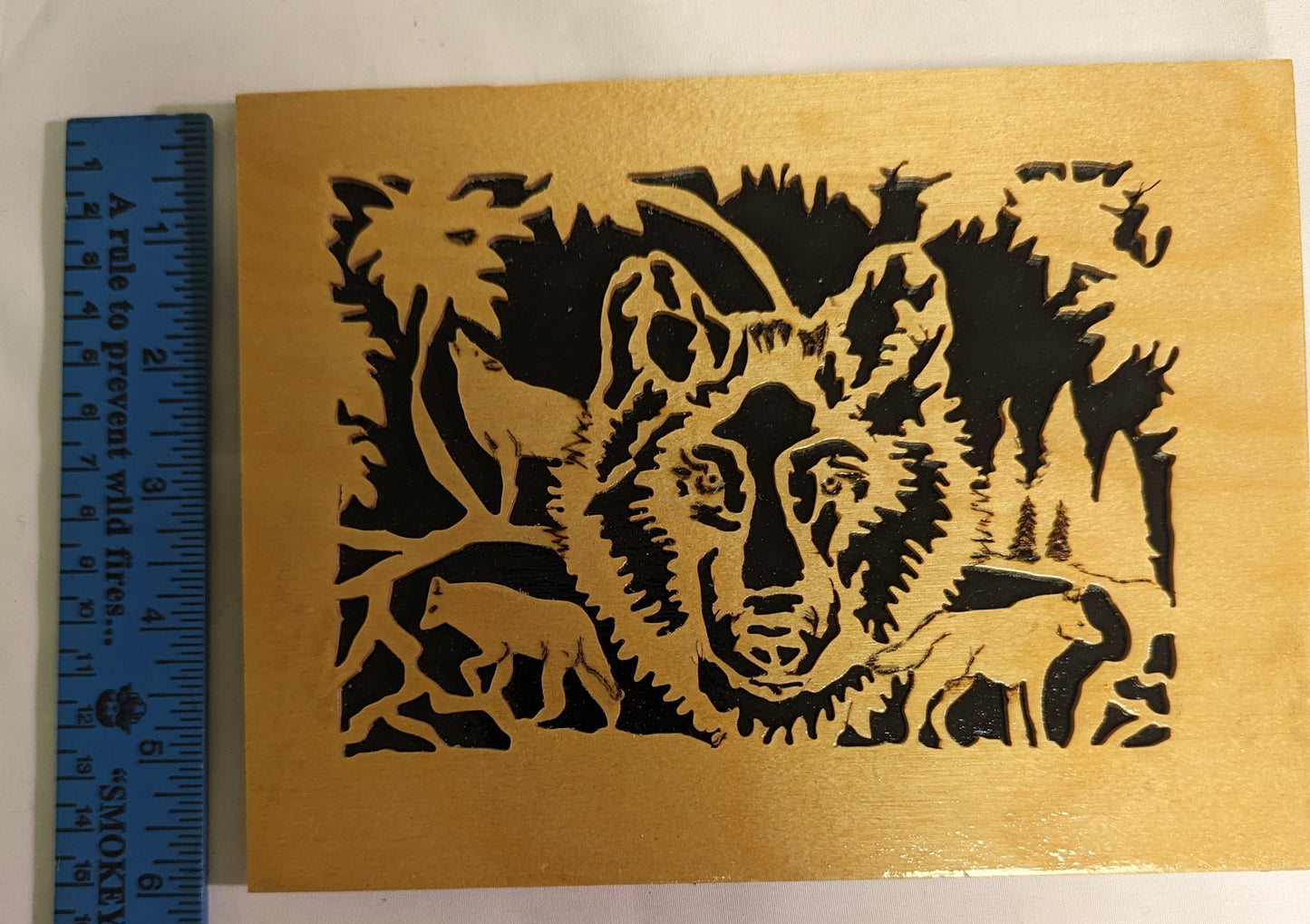 Art Original Scroll Cutout Wolves in Night Forrest Emblem Black Background