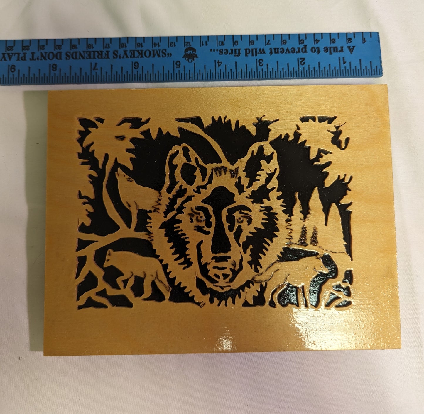 Art Original Scroll Cutout Wolves in Night Forrest Emblem Black Background