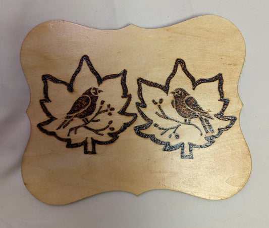 Art Pyrography Two Birds Emblem on Leaves Burned in Wood