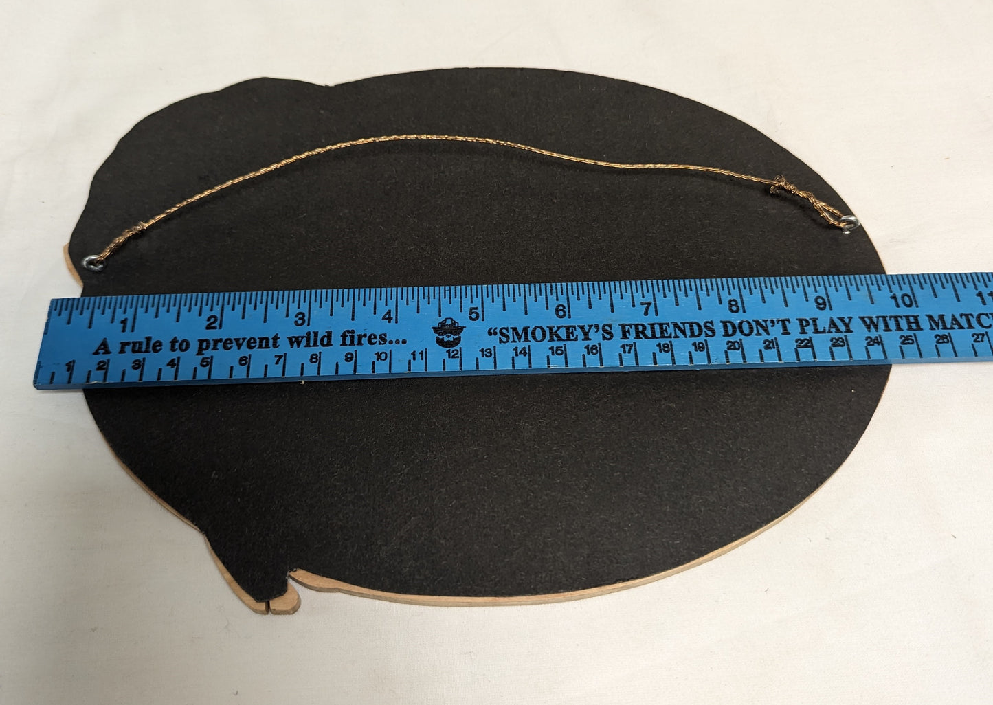 Art Scroll Saw Cut Emblem of Chipmunk smelling flower on plywood