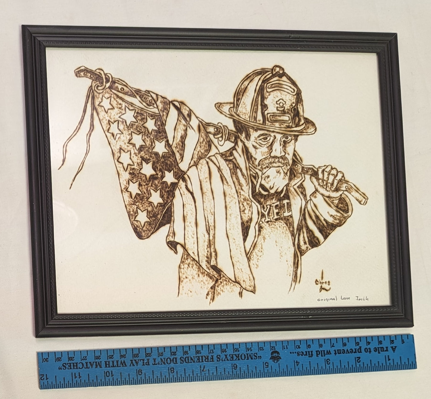 Art Pyrography New York City Fireman holding American Flag