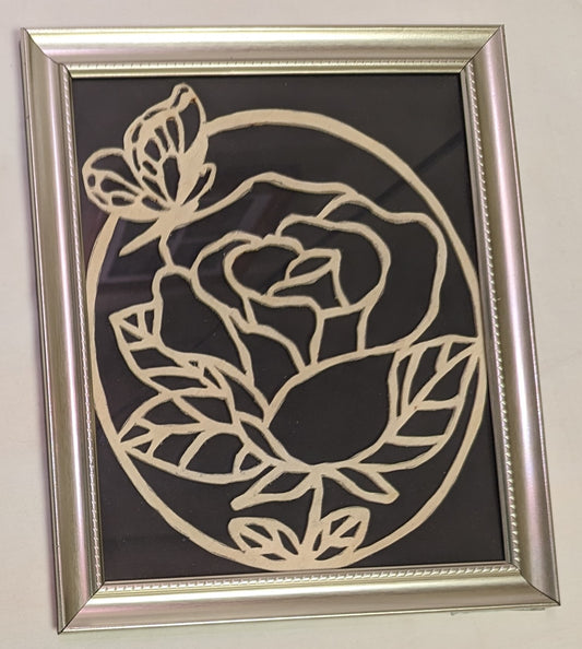 Art Scroll Saw Flower and Butterfly Cut over Black Background in Frame under glass