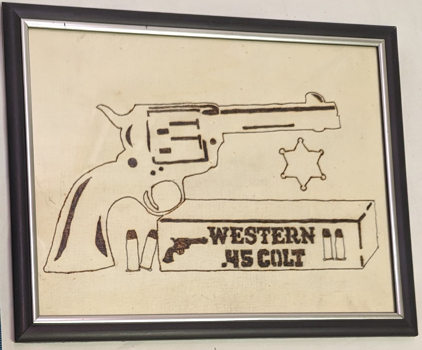 Art Pyrography Pistol and Shells Emblem on wood in frame under glass