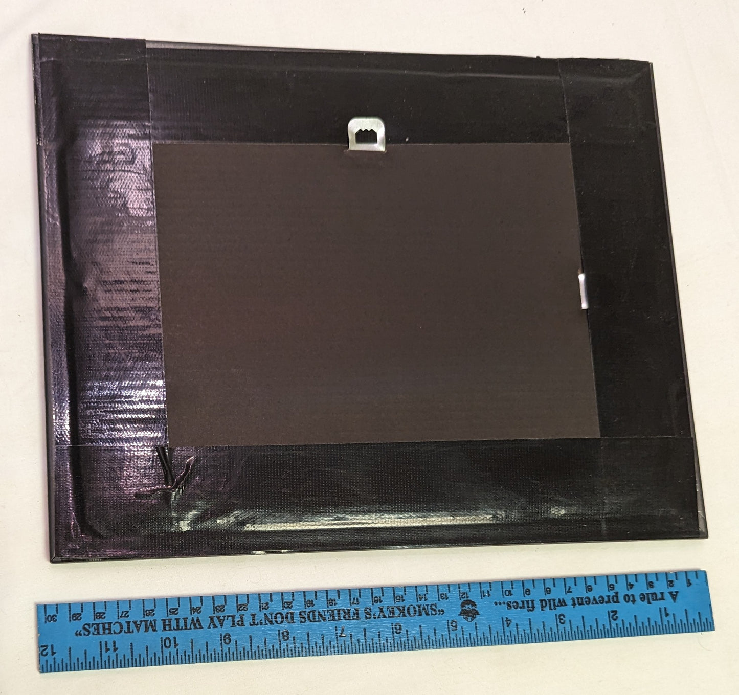 Art Pyrography Pistol and Shells Emblem on wood in frame under glass