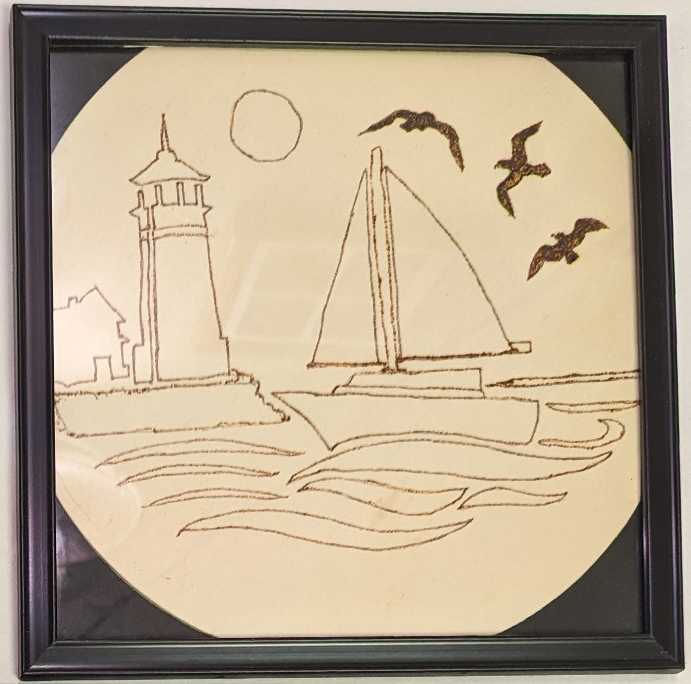 Art Pyrography Hand Burned on Wood Sailboat and lighthouse under glass in frame