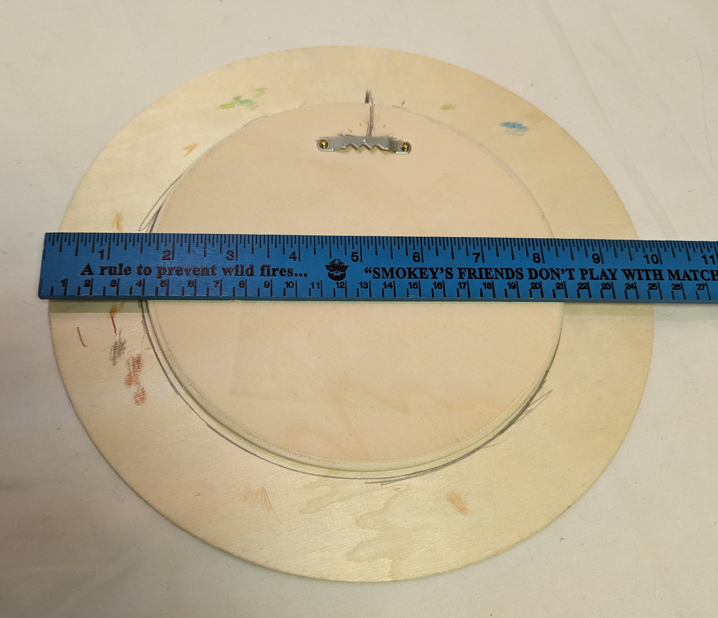 Art Pyrography painted filled on round wood. Buck and Bunny Mountain Scene