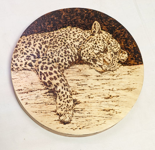 Art Pyrography on Heavy Recycled Round Plywood " Sleeping Leopard "