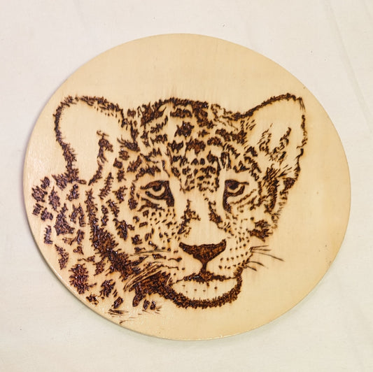 Art Pyrography on round plywood" Leopard Face" Original Artist Acredited.