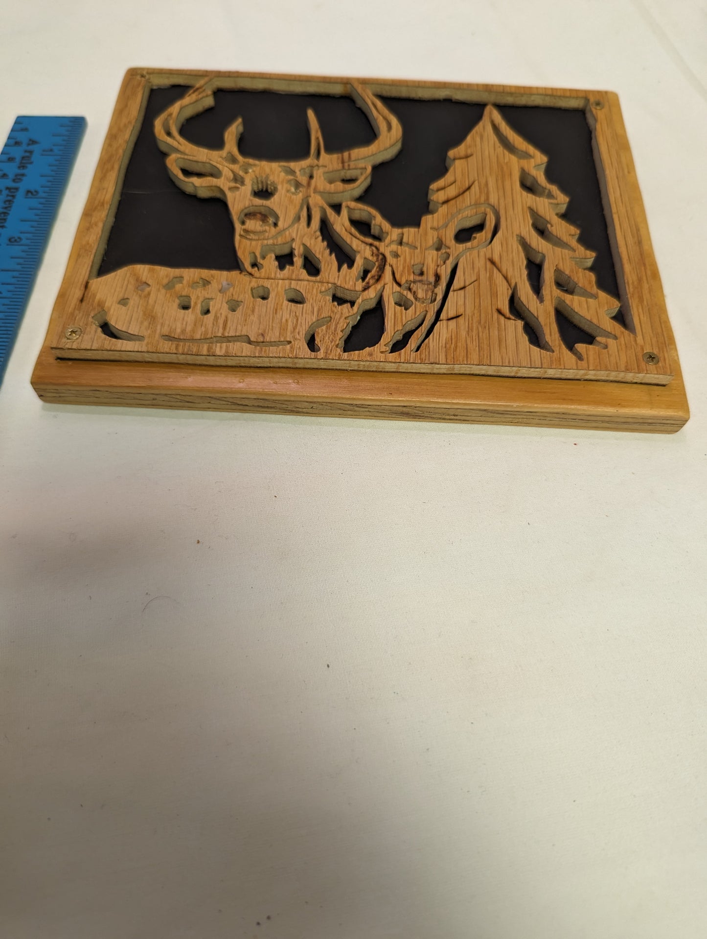 Art Scroll Sawed Layered Wood with Brass Screws Negative in Frame