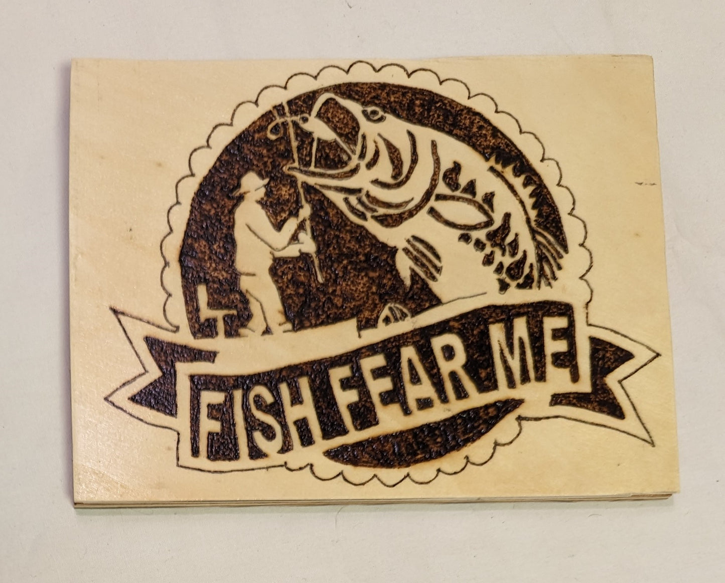 Art Pyrography on wood Sign Emblem of Fish Fear Me Man Catching Big Bass