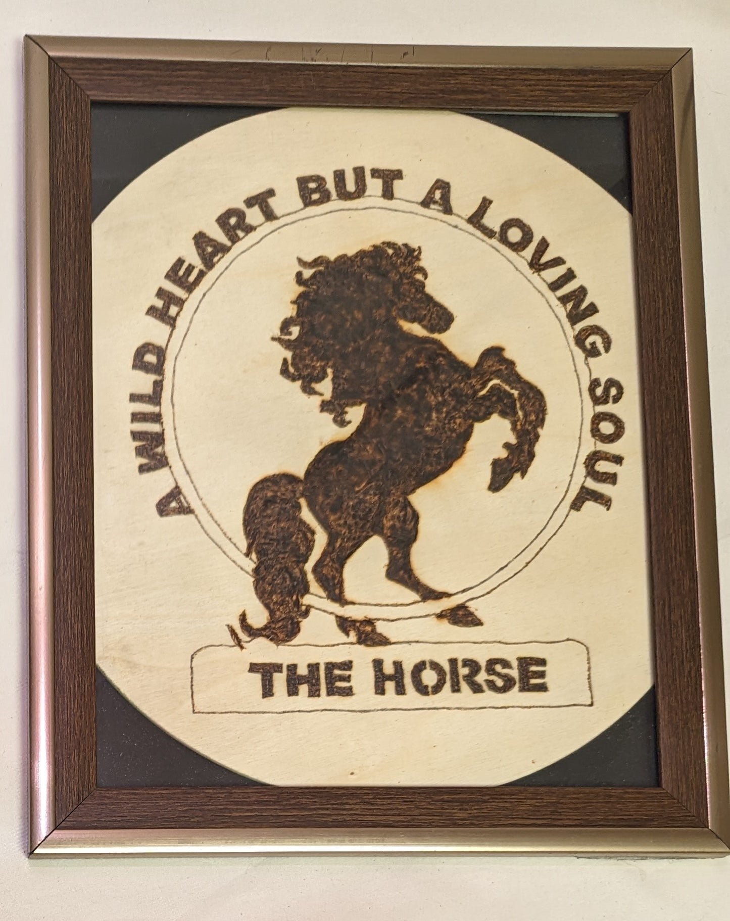 Art Pyrography Sign on round wood " The Horse" A Wold Heart But a Loving Soul in frame under glass