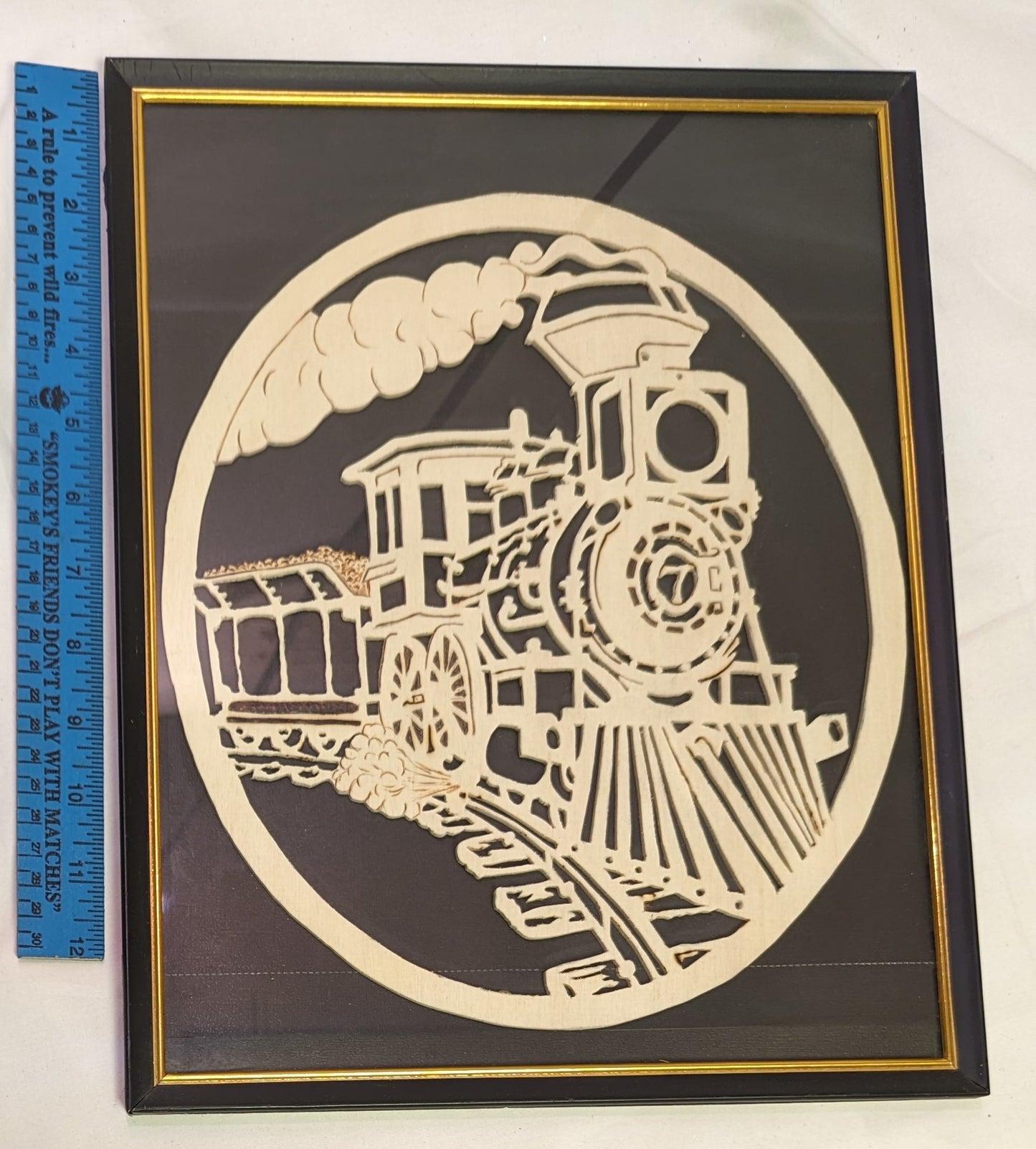 Art Scroll Saw of oval wood " Old No 7 Locomotive " in frame under glass