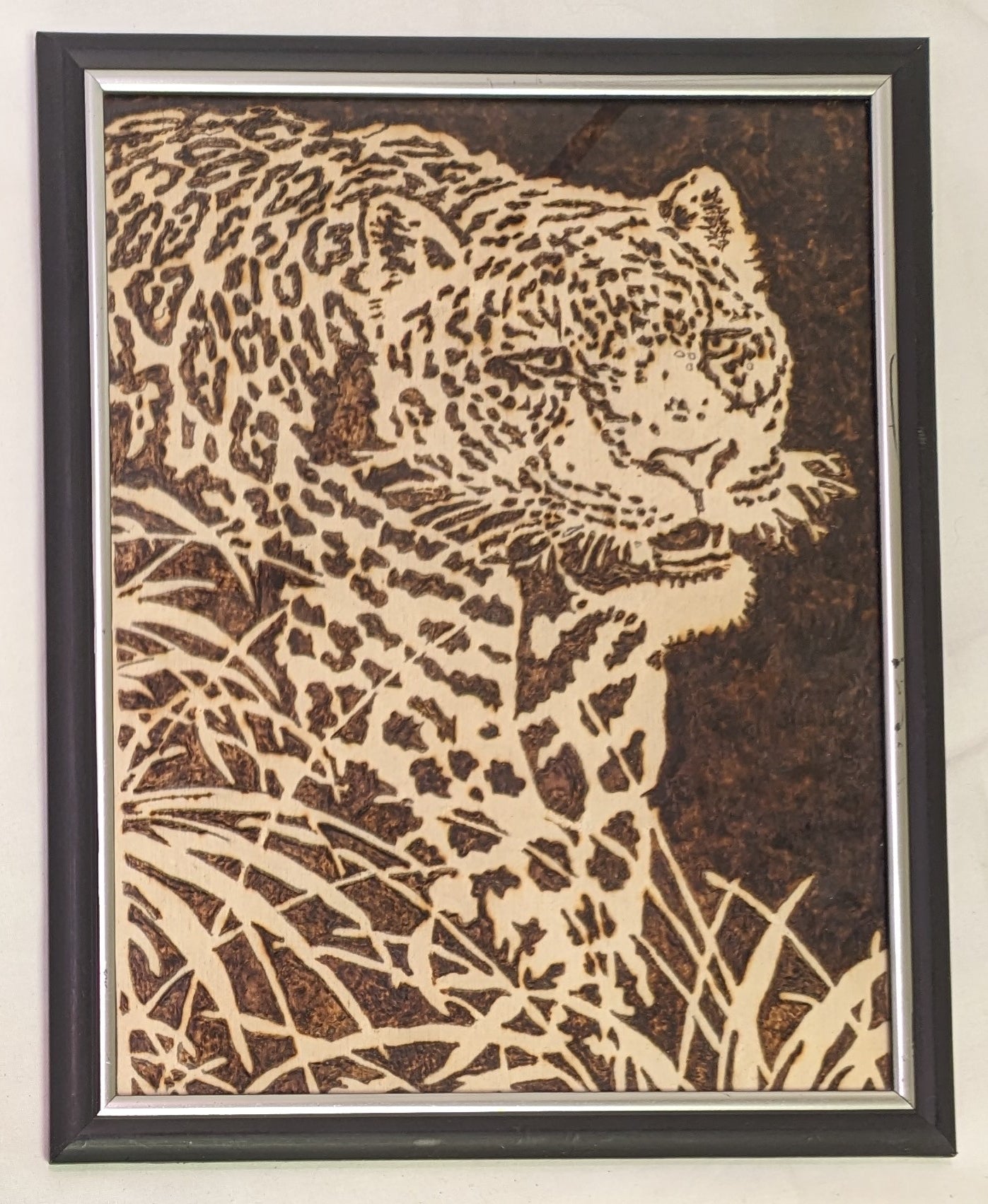 Art Pyrography on wood " Stalking Leopard" in frame under glass