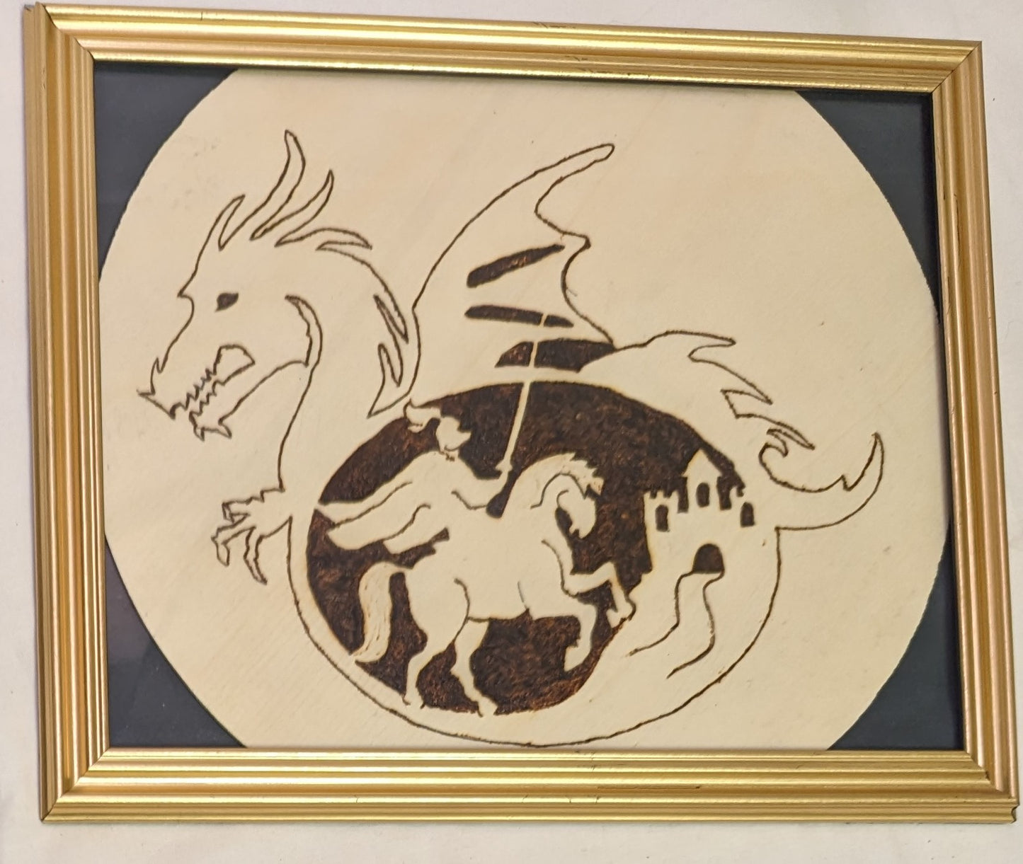 Art Pyrography on round wood Emblem Knoght in Dragon in frame under glass