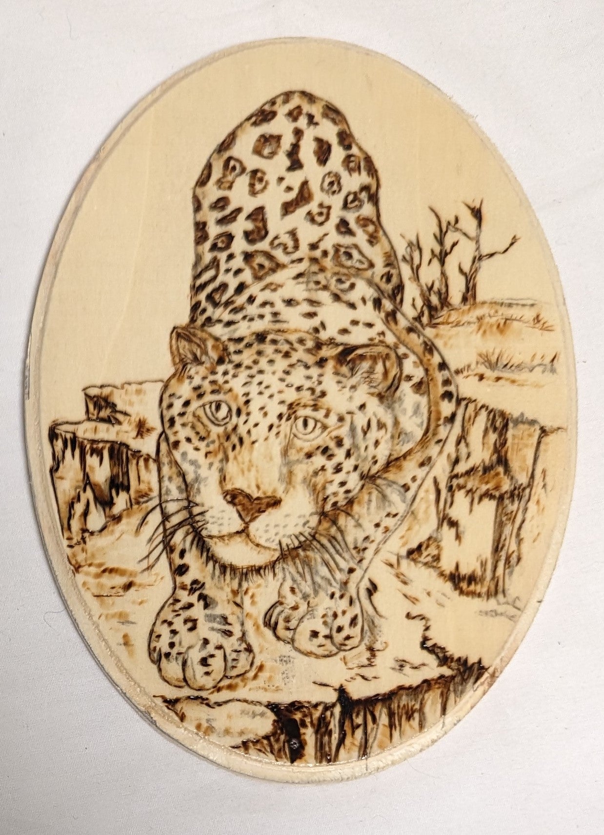 Art Hand Pyrography on Oval wood " Leopard Creeping"