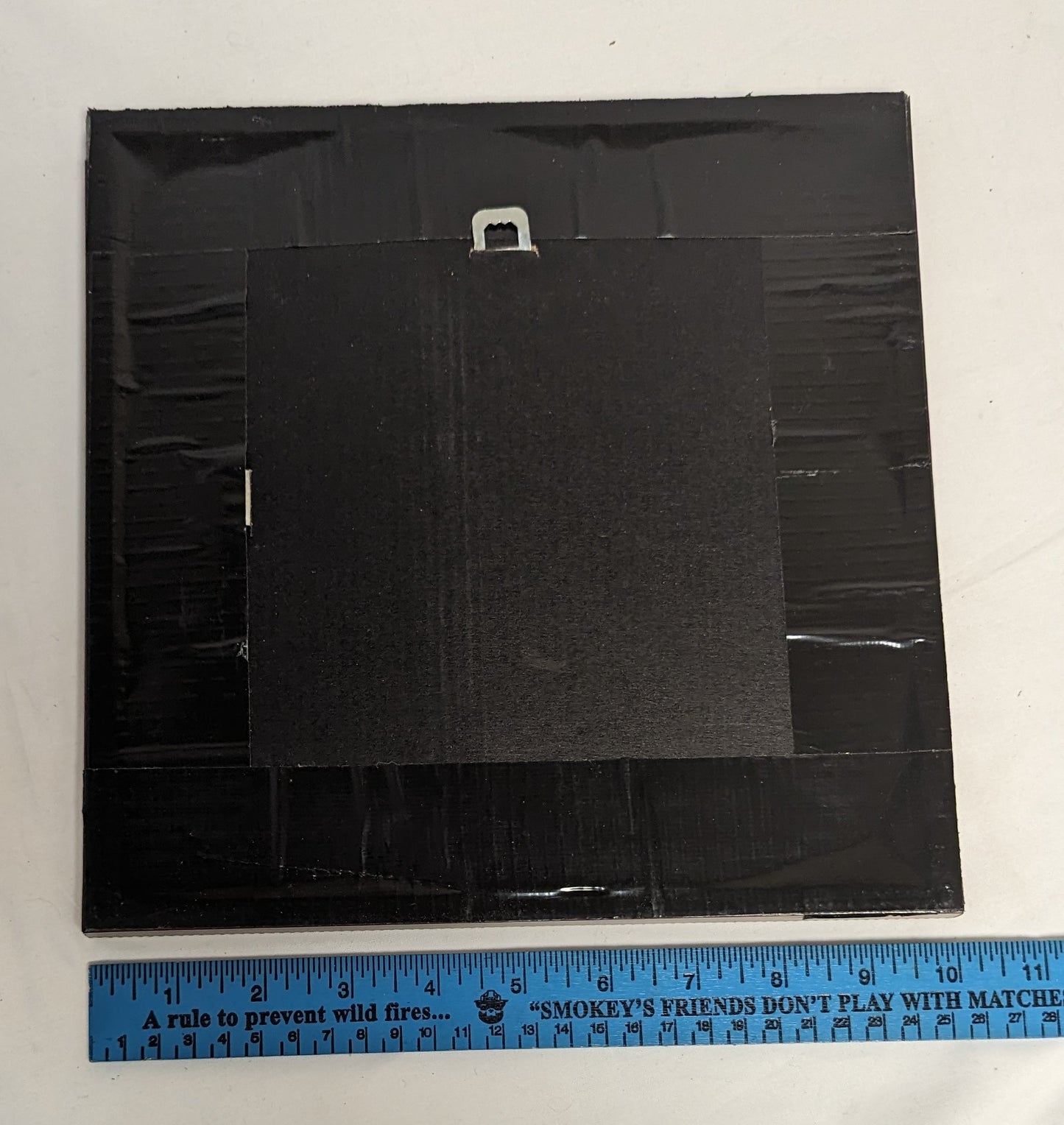 Art Hand Scroll Sawn A"Eagle on Maple Leaf Emblem" in frame under glass