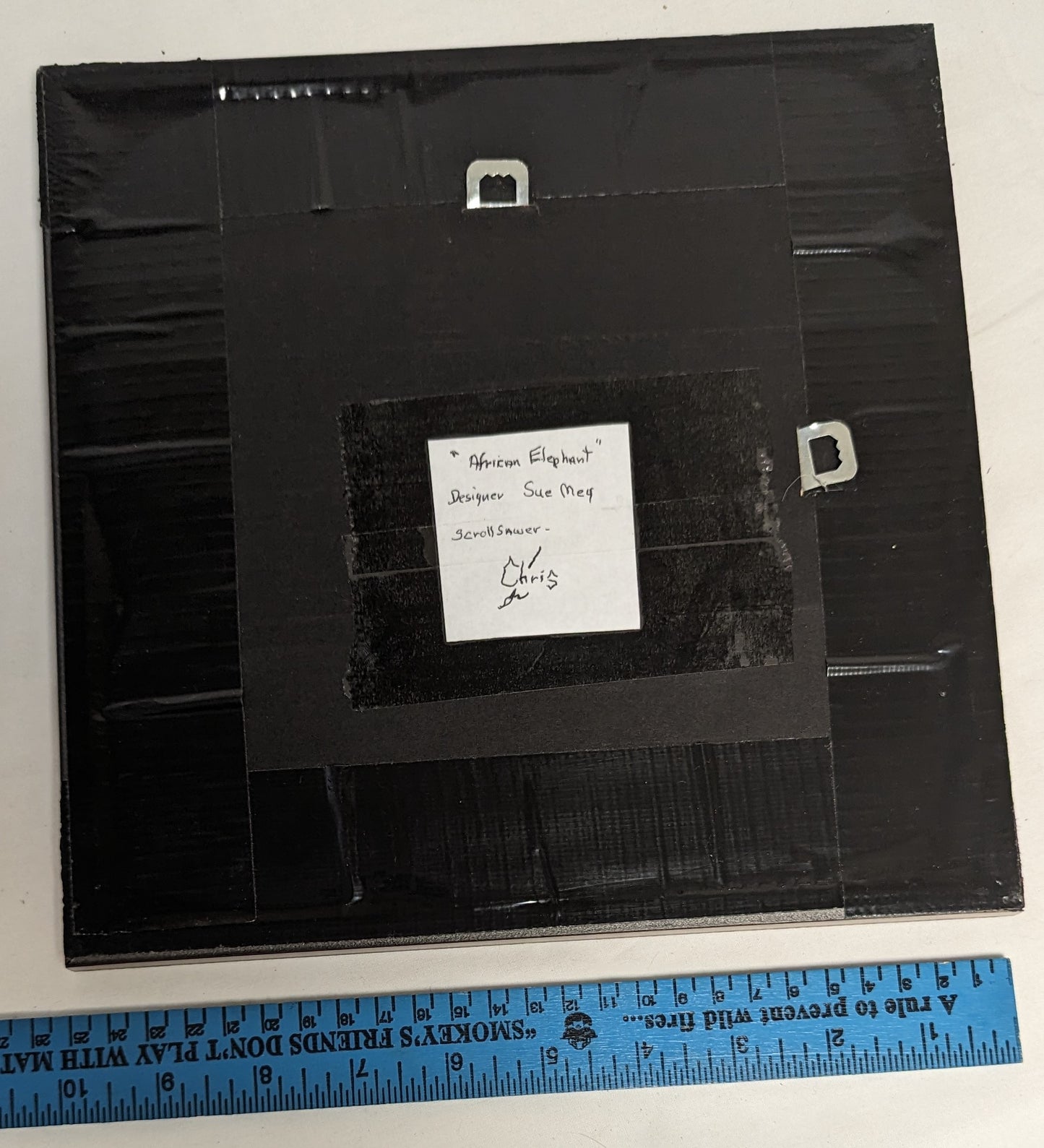 Art Hand Scroll Sawn African Elephant" in frame under glass  Credited and Autographed