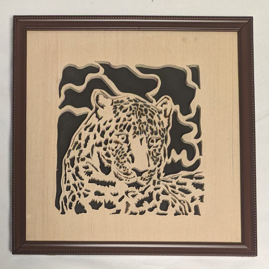 Art Hand Scroll Sawn Leopard Cut Out " in frame under glass