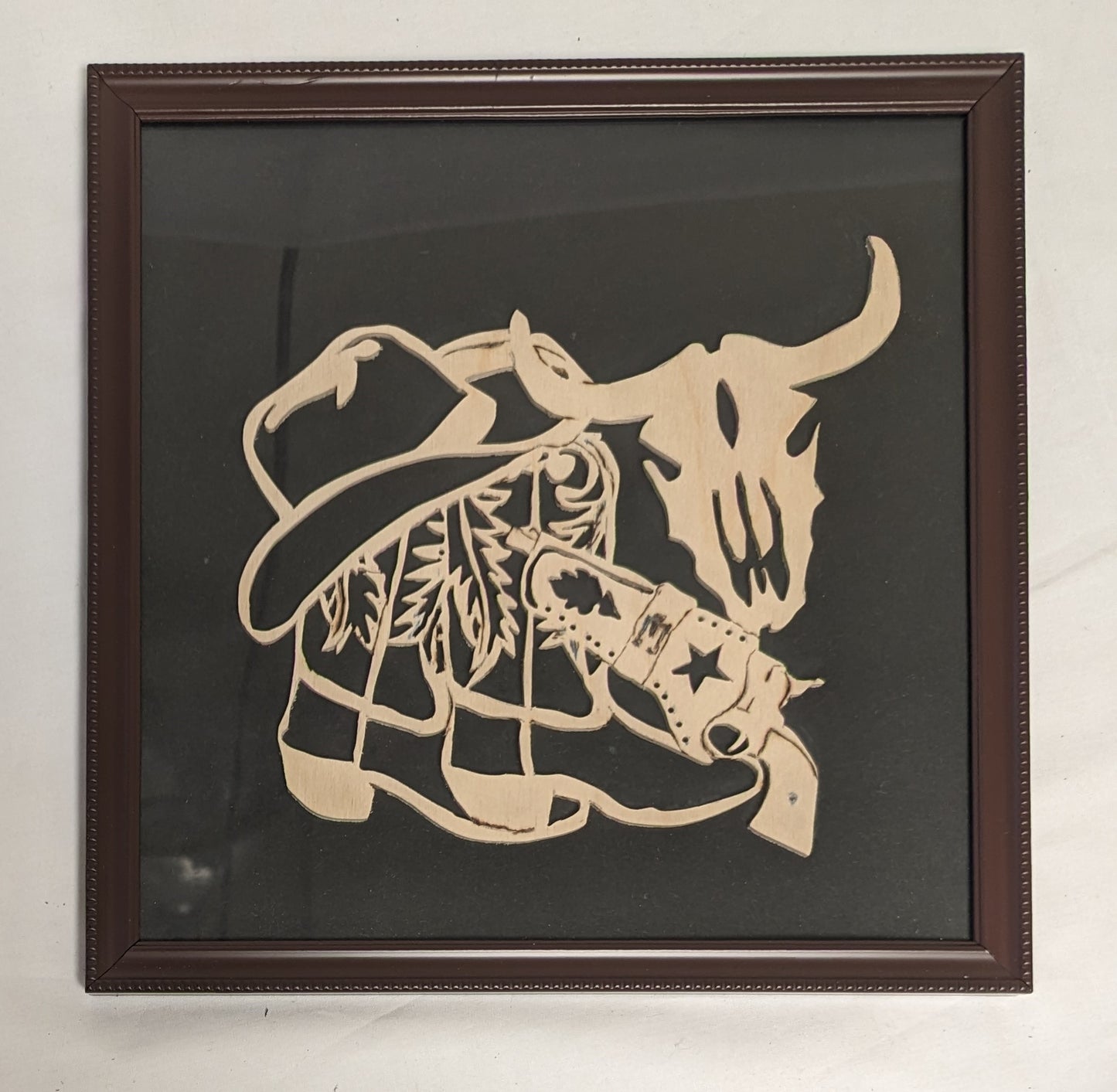 Art Hand Scroll Sawn Delicate "Cowboy Emblem" in frame under glass