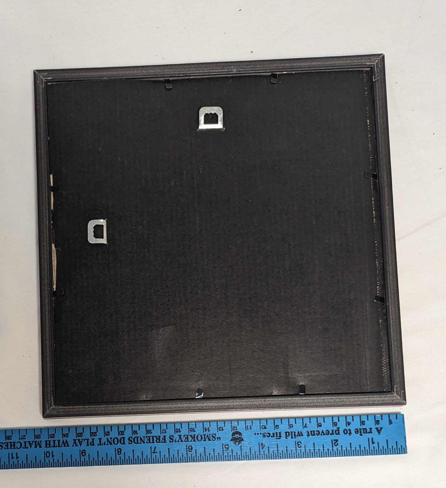 Art Hand Scroll Sawn Delicate "Cowboy Emblem" in frame under glass