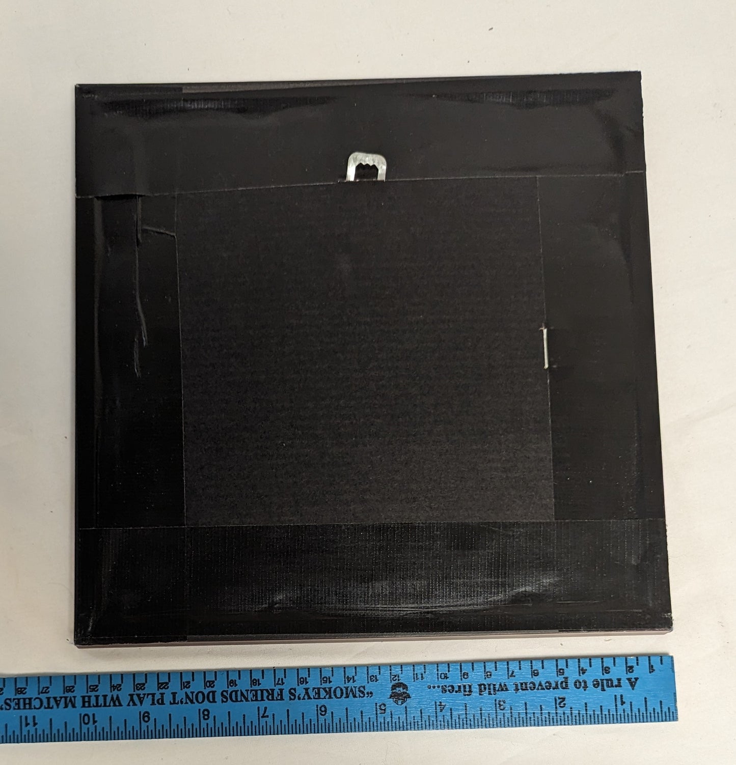 Art Hand Scroll Sawn Delicate "Bee on Comb" Emblem in frame under glass