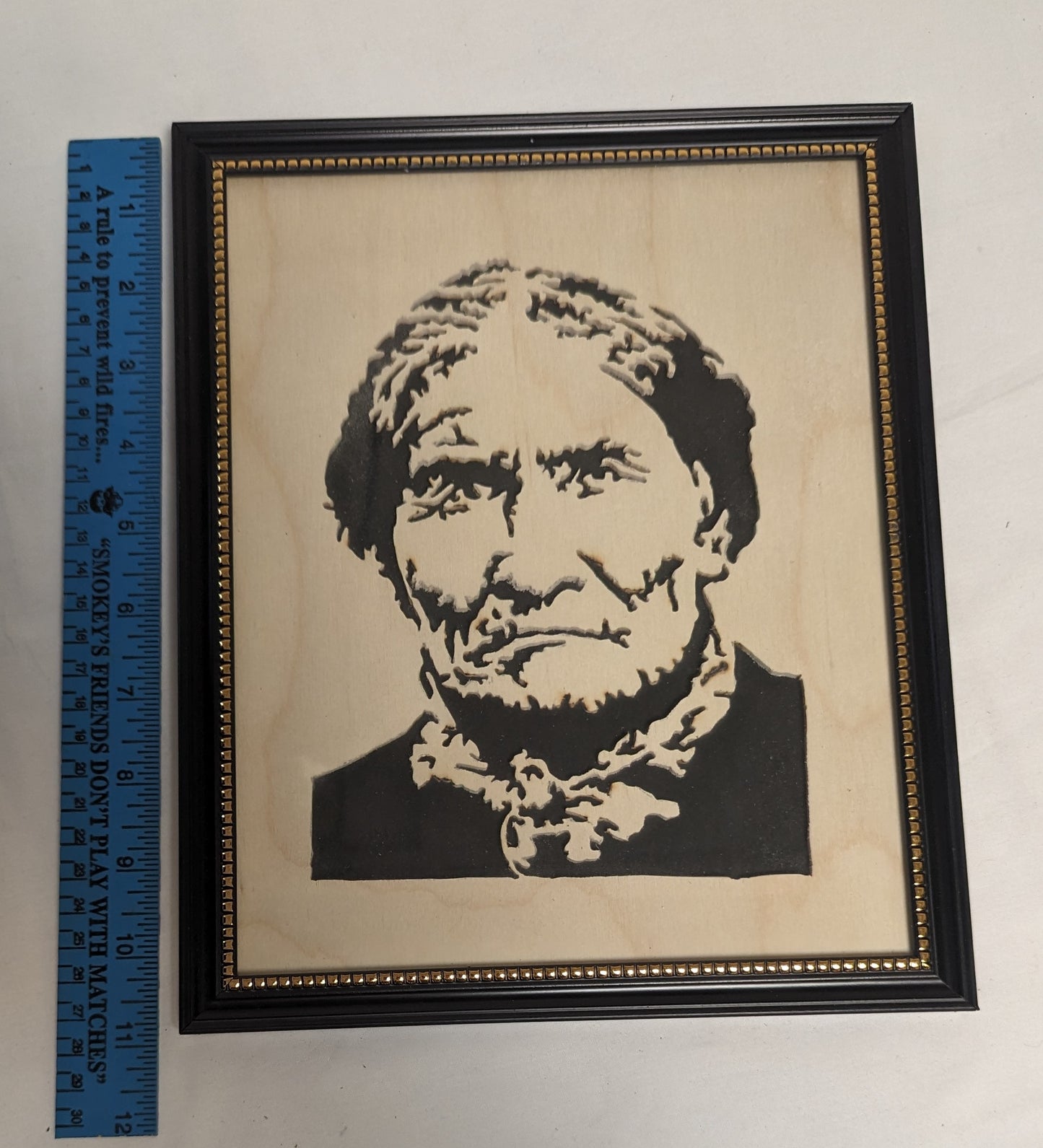 Art Hand Scroll Sawn Cut Out " Geronimo" Portait in frame under glass  Credited and Autographed