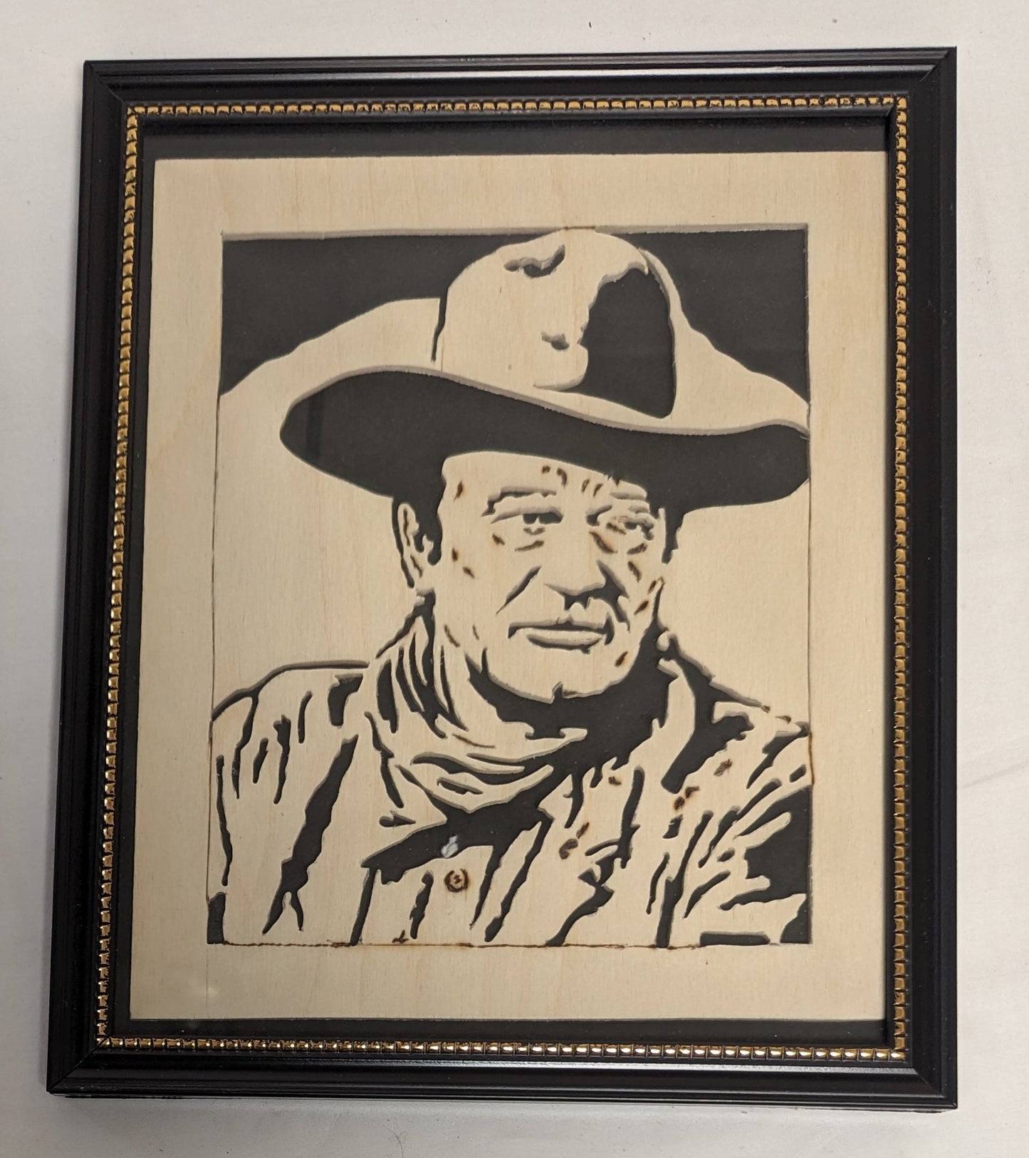 Art Hand Scroll Sawn Cut Out " John Wayne " Portait in frame under glass  Credited and Autographed