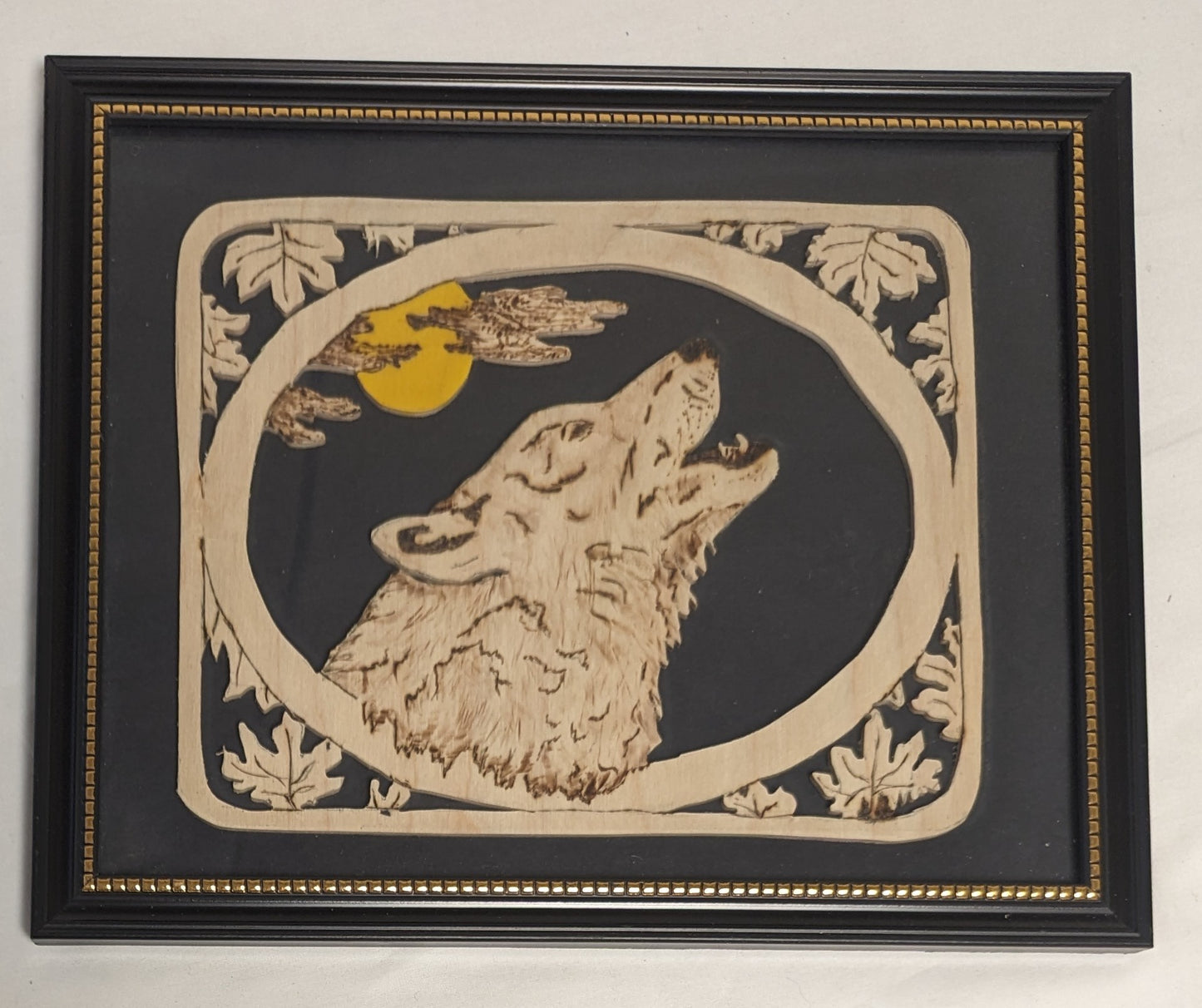 Art Hand Pyrography Burned and Scroll Sawn Cutout Emblem " Wolf Howl"  in frame under glass
