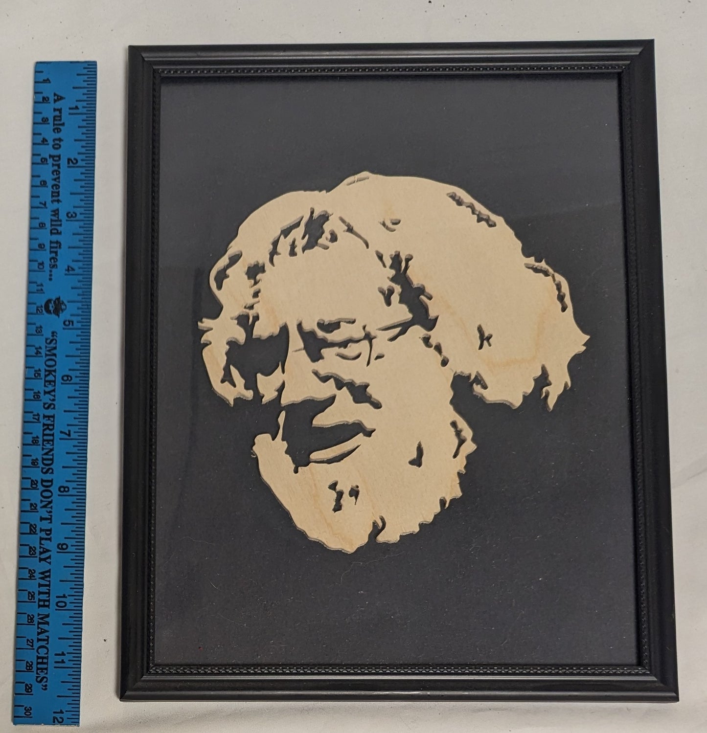 Art Hand Scroll Sawn Cutout Emblem "Jerry Garcia" in Frame under Glass