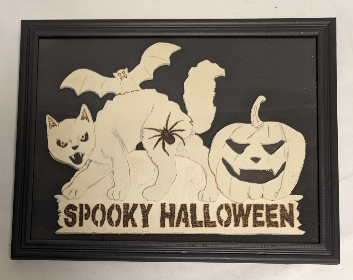 Art Handmade Scroll Sawn Pyrography on wood board " Spooky Haloween"  in frame under glass
