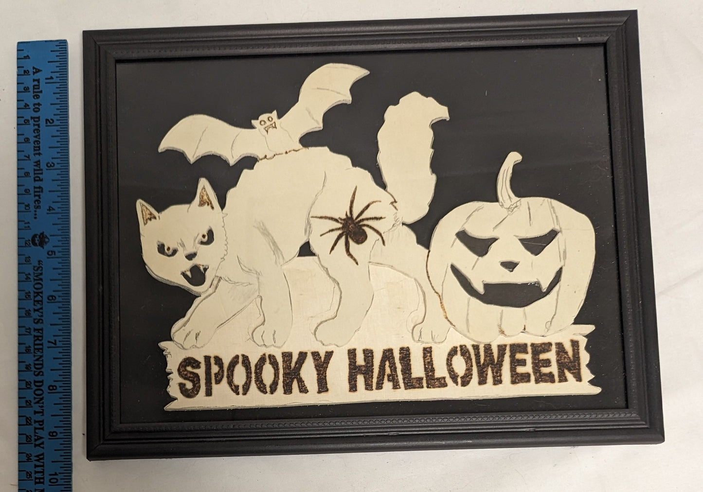 Art Handmade Scroll Sawn Pyrography on wood board " Spooky Haloween"  in frame under glass