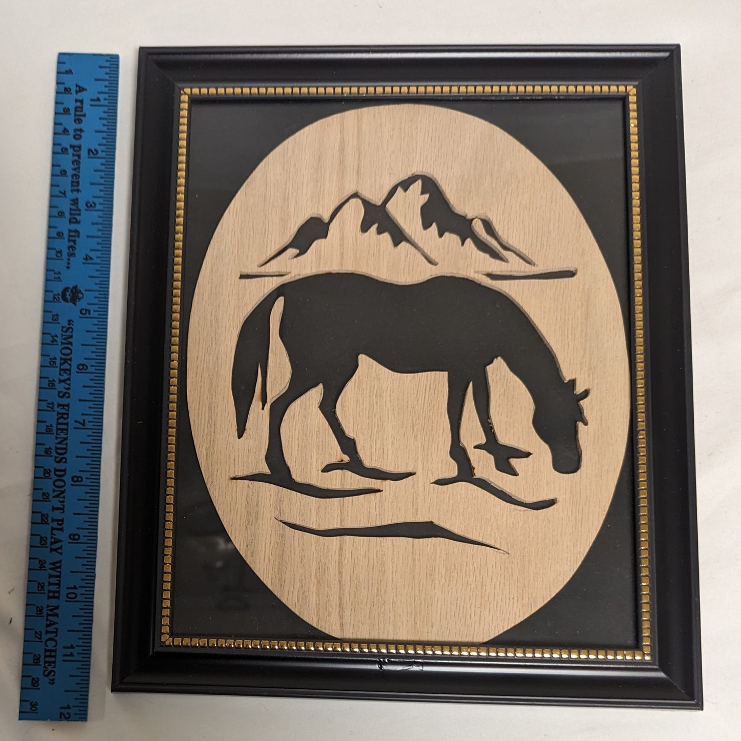 Art Scroll Sawn on wood Emblem " Grazing Horse: In frame under glass